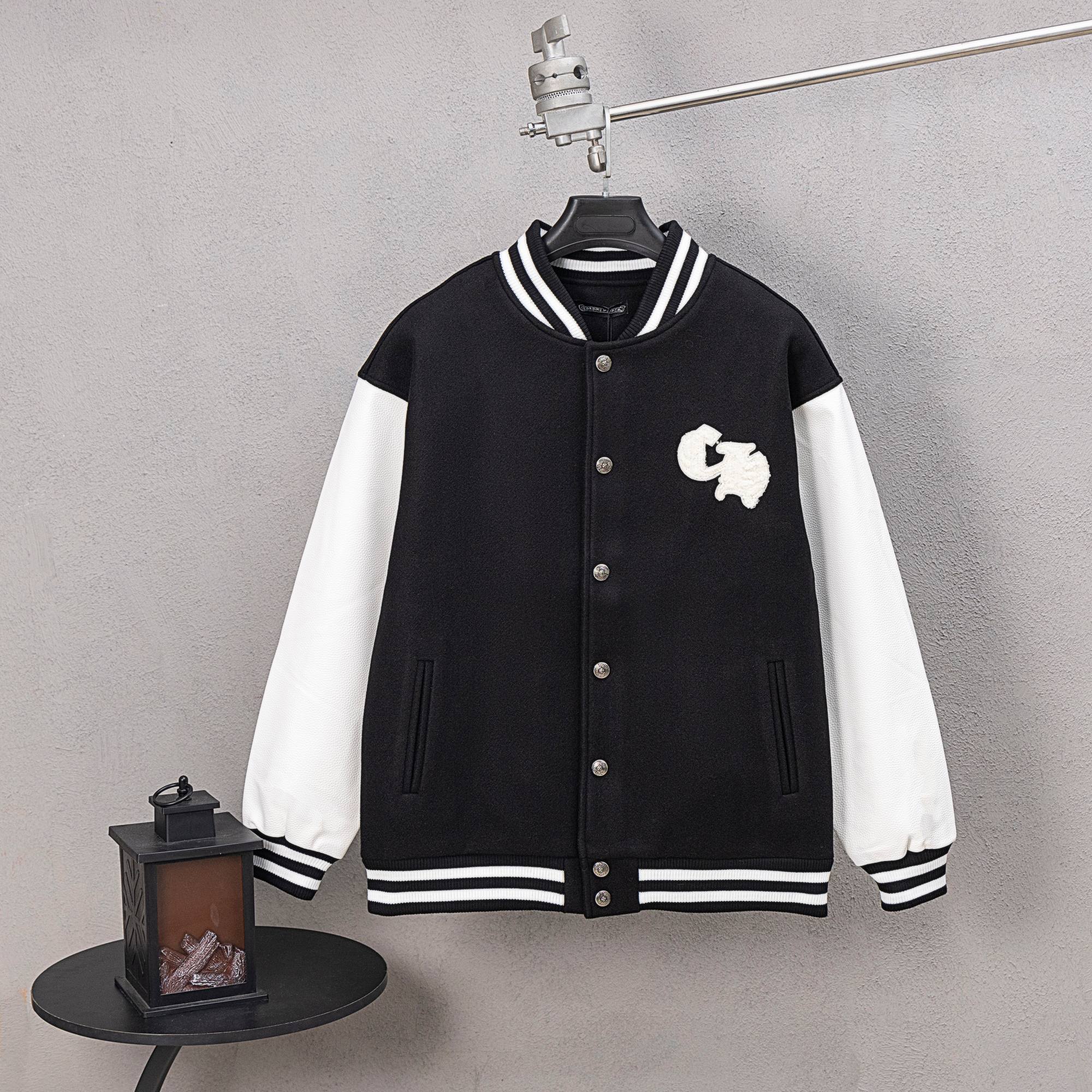 Black and white varsity jacket with button front and striped ribbed collar