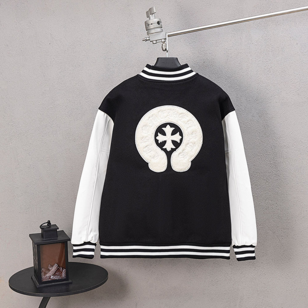 Black and white varsity jacket with large white back graphic and crest emblem