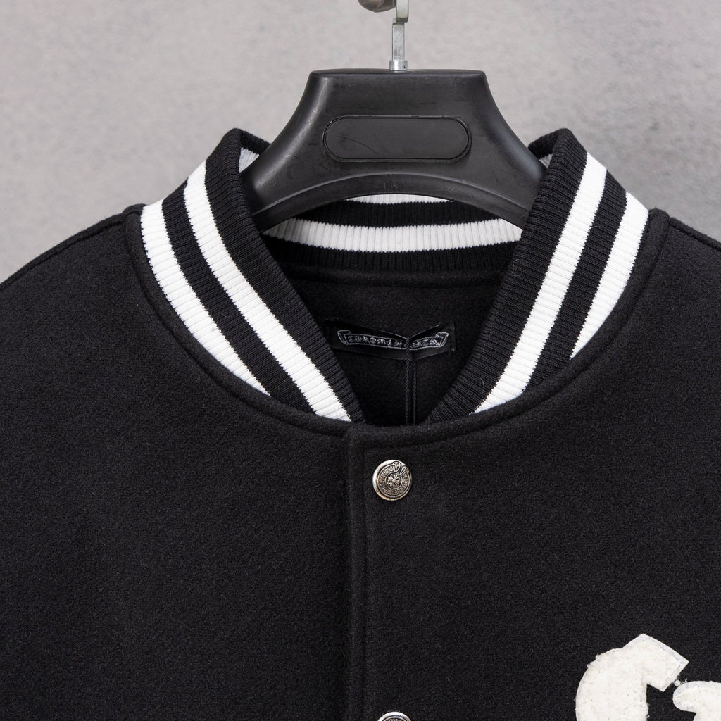 Black varsity jacket with striped ribbed collar and snap button placket