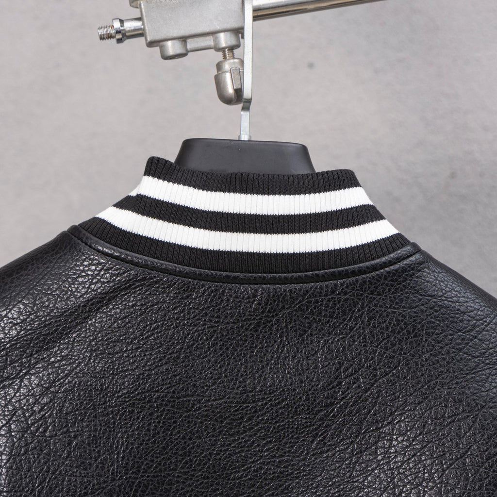 Black leather jacket neck ribbing with bold white-striped collar band