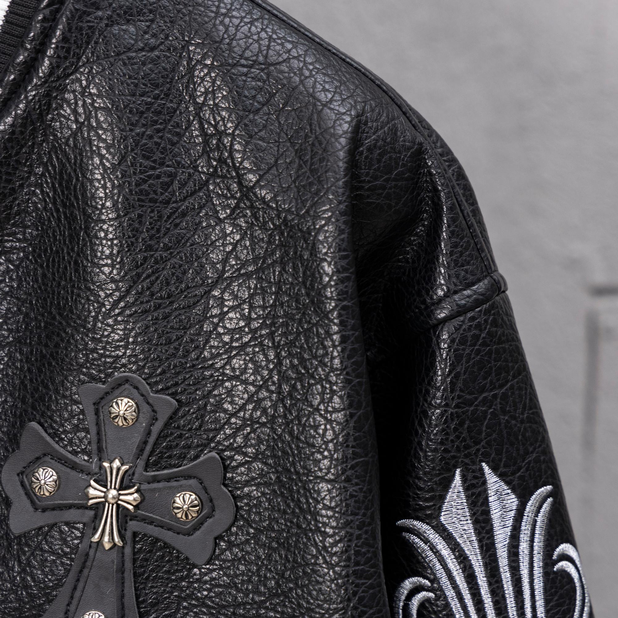 Black leather sleeve with cross emblem and white flame-style embroidery detail