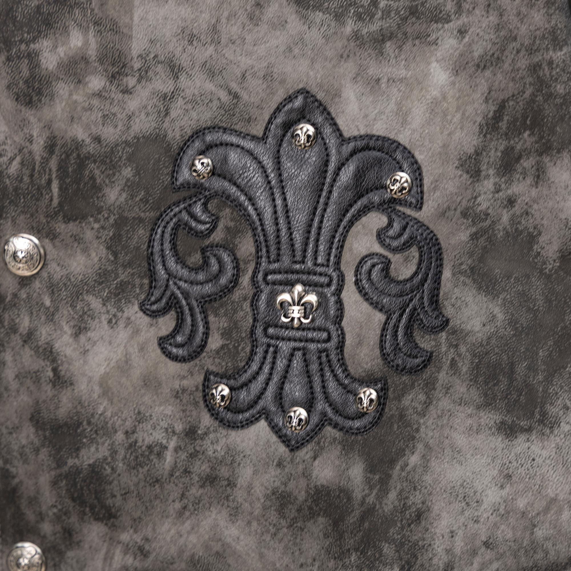 Varsity jacket fleur-de-lis patch with central emblem and small silver studs