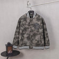 Long-sleeve button varsity jacket with black fleur-de-lis crest, striped cuffs and hem