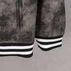 Long-sleeve varsity jacket sleeve cuff with ribbed black-and-white stripes