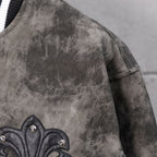 Varsity jacket gray patterned body with black fleur-de-lis applique at sleeve edge