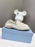 Prada suede loafers, light beige with front strap and black rubber sole