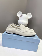 Prada suede loafers, light beige with front strap and black rubber sole