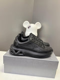 Prada unisex sneakers, black lace-up with chunky rubber sole