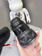 Prada unisex sneakers, black rubber heel with glossy strap detail