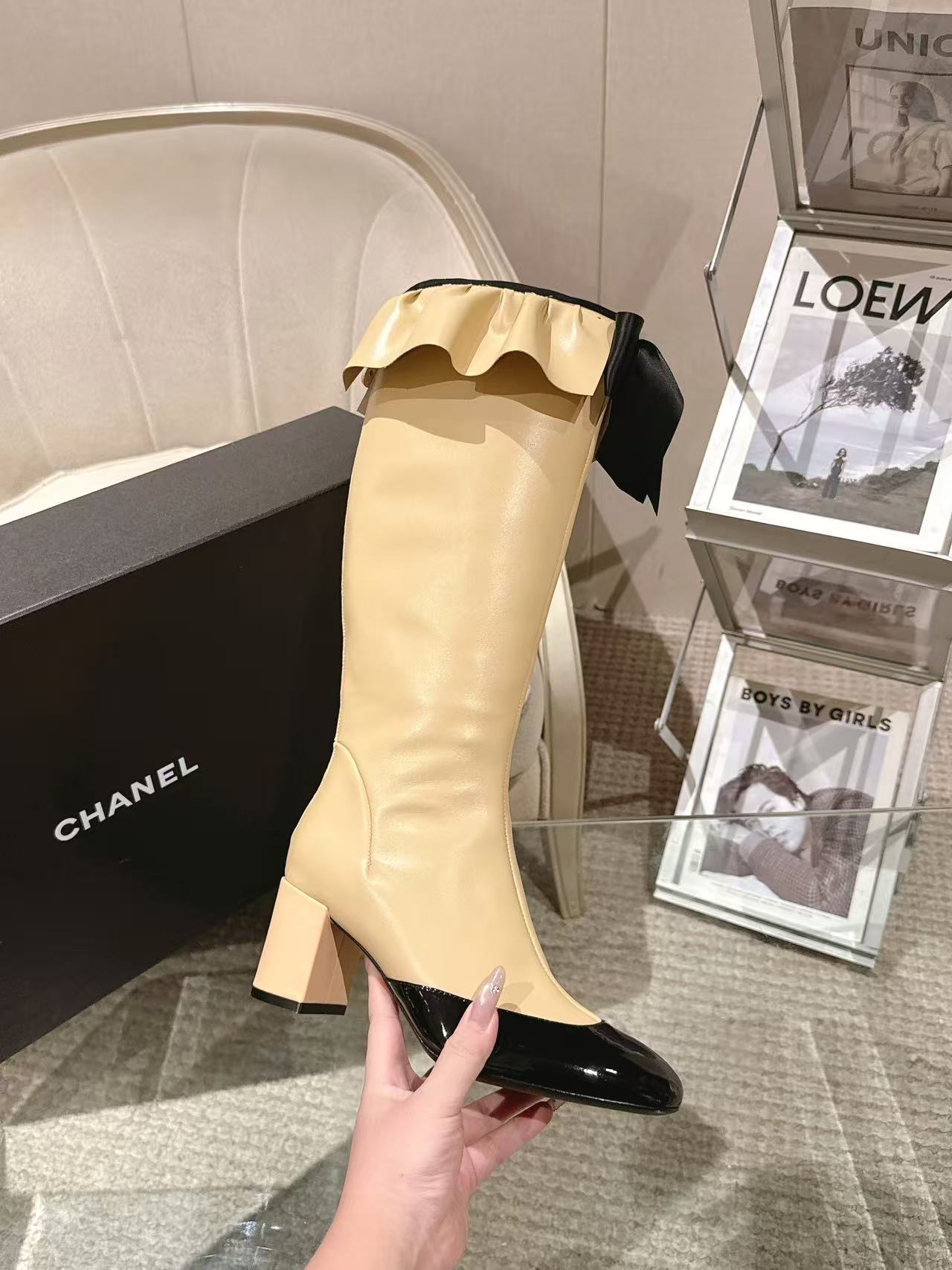 Chanel ladies’ knee-high boots with block heel, cream shaft, black patent toe