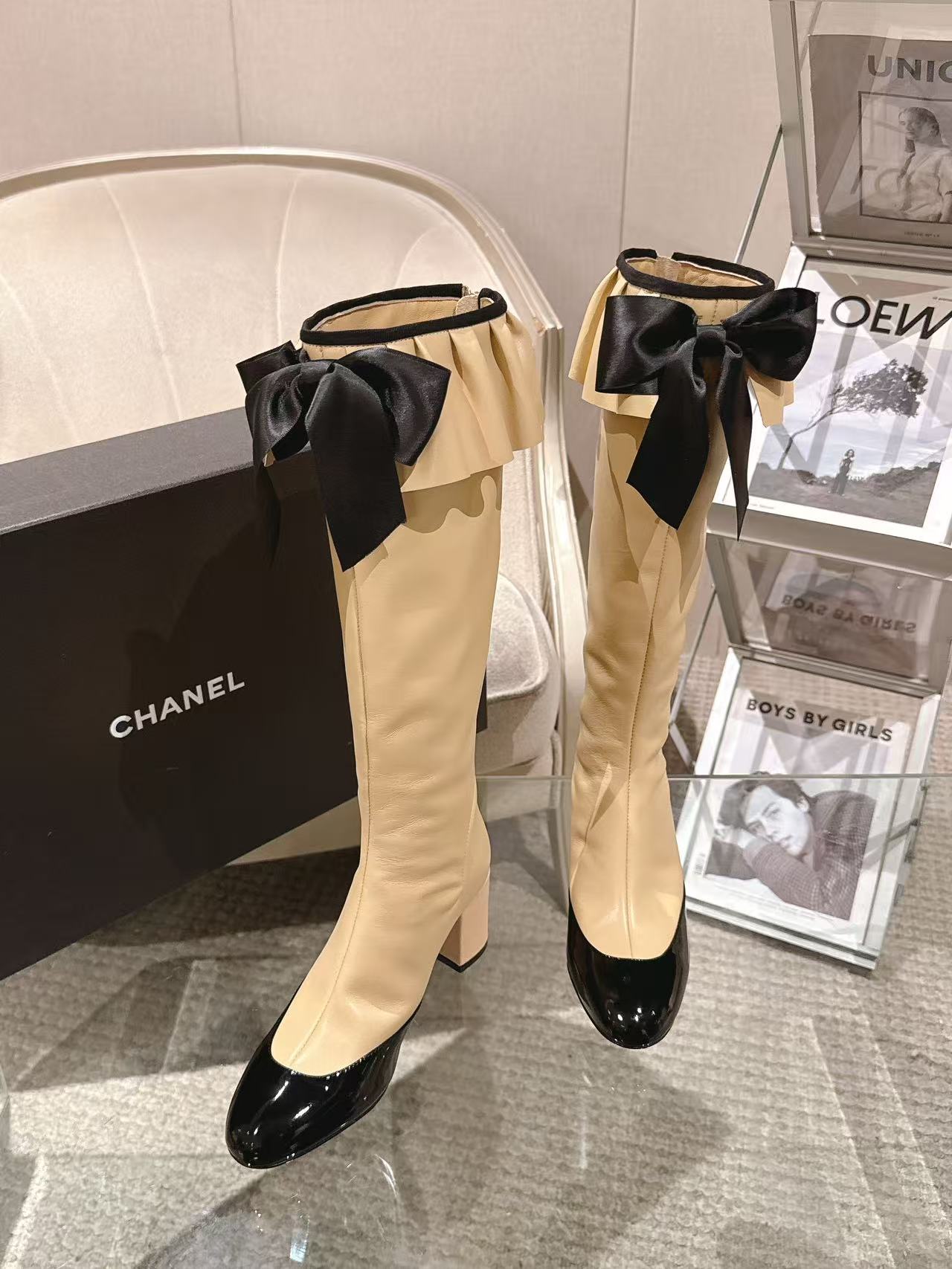 Chanel ladies’ knee-high boots with cream shaft and black glossy toe