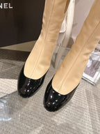 Chanel ladies’ knee-high boots: cream upper and black glossy toe, low heel