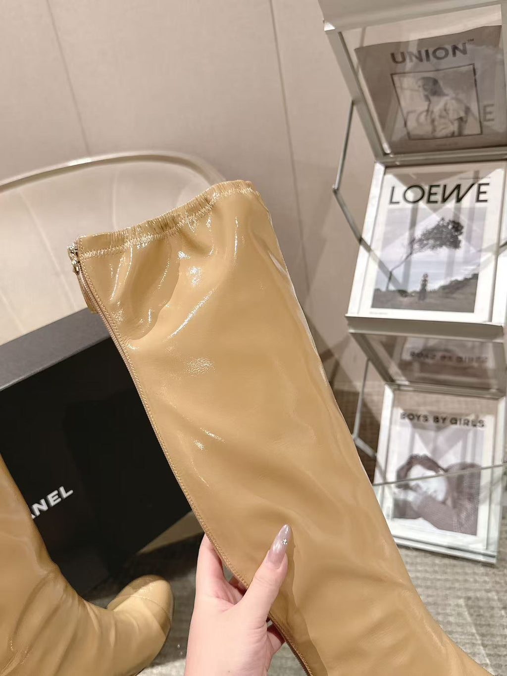 Chanel glossy beige knee-high boots, stacked front view