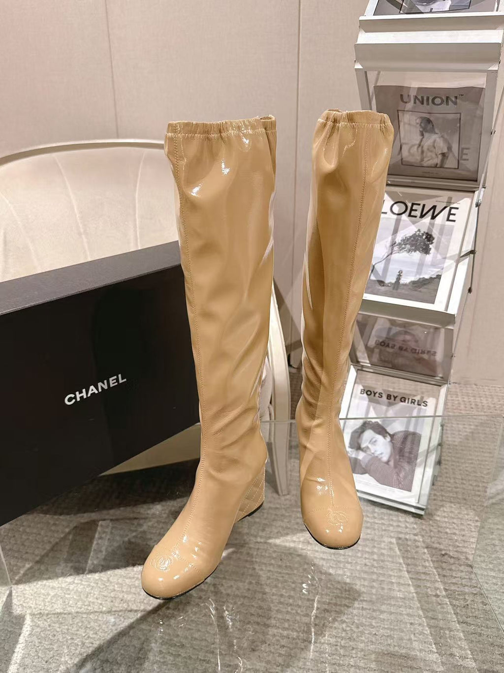 Chanel glossy beige knee-high boots with slim heel, standing pair