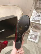 Red boot outsole underside with logo and size markings