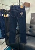 Dark blue Gucci denim jeans with rose patch on back pocket