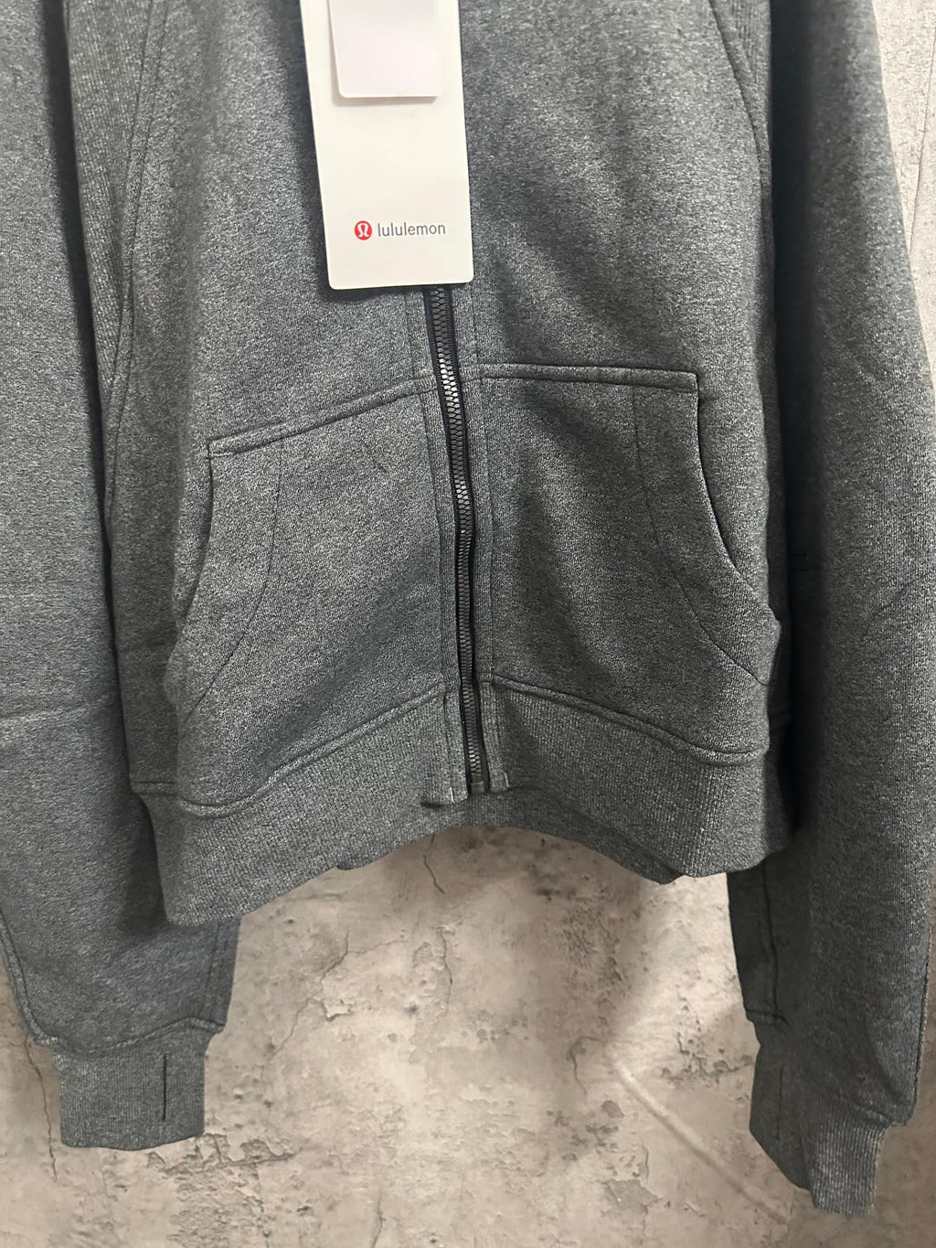Dark gray hoodie jacket with full front zipper and side pockets