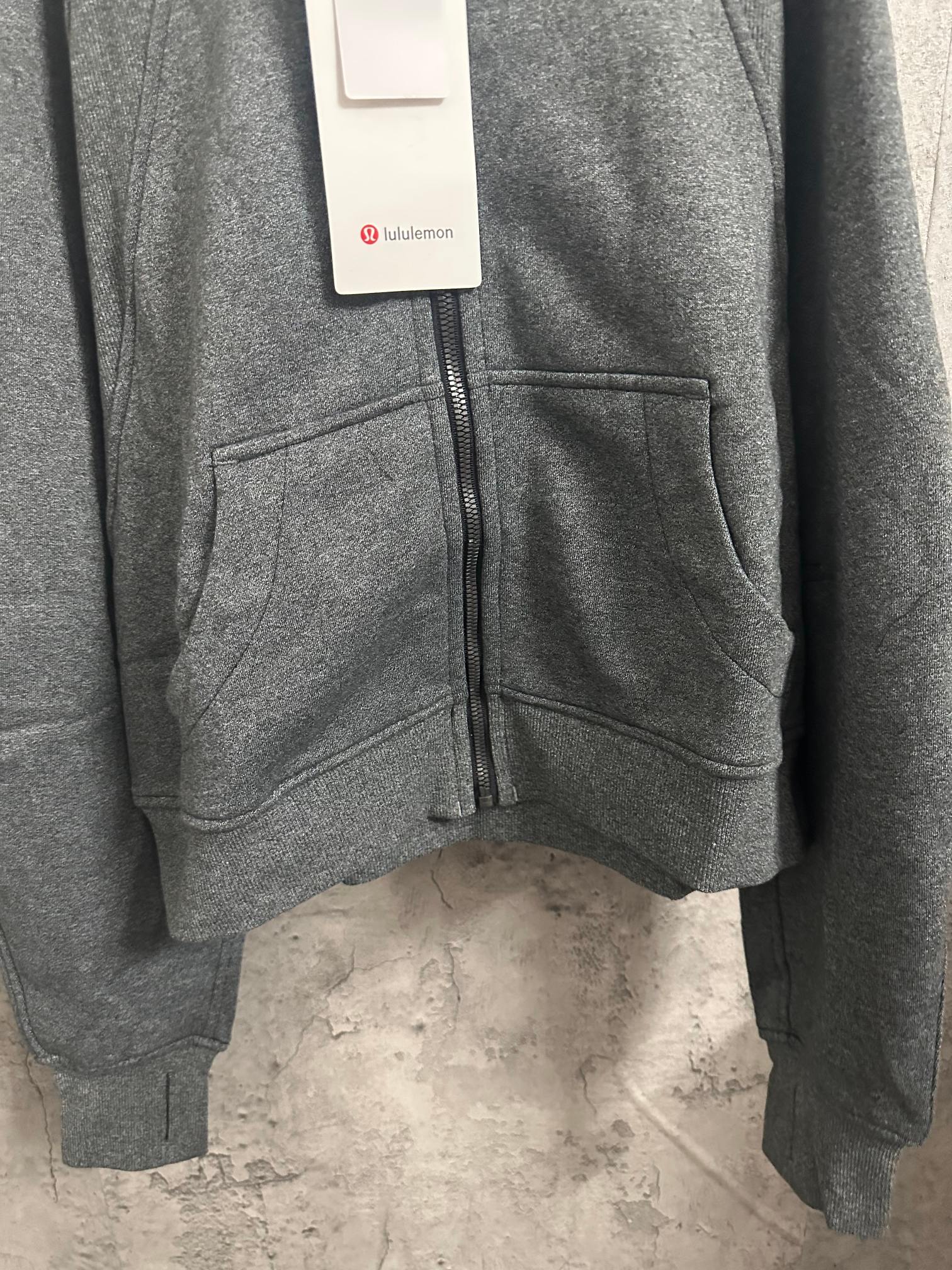 Dark gray hoodie jacket with full front zipper and side pockets