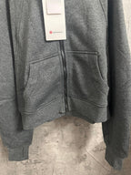 Heather gray zip-up hoodie with front zipper and kangaroo pocket seams
