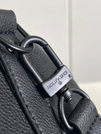 Louis Vuitton bag strap with metal clasp and engraved strap label