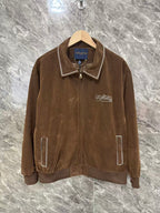 Brown jacket with pointed collar, white-trimmed zipper front, LV logo patch