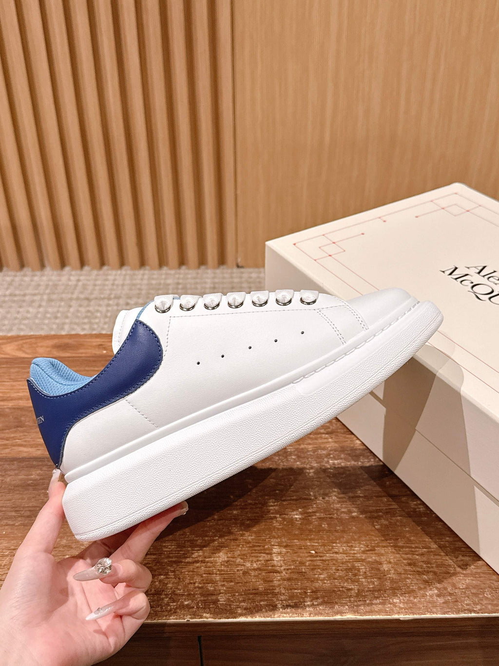White leather sneakers with blue heel panel and lace eyelets, Alexander McQueen