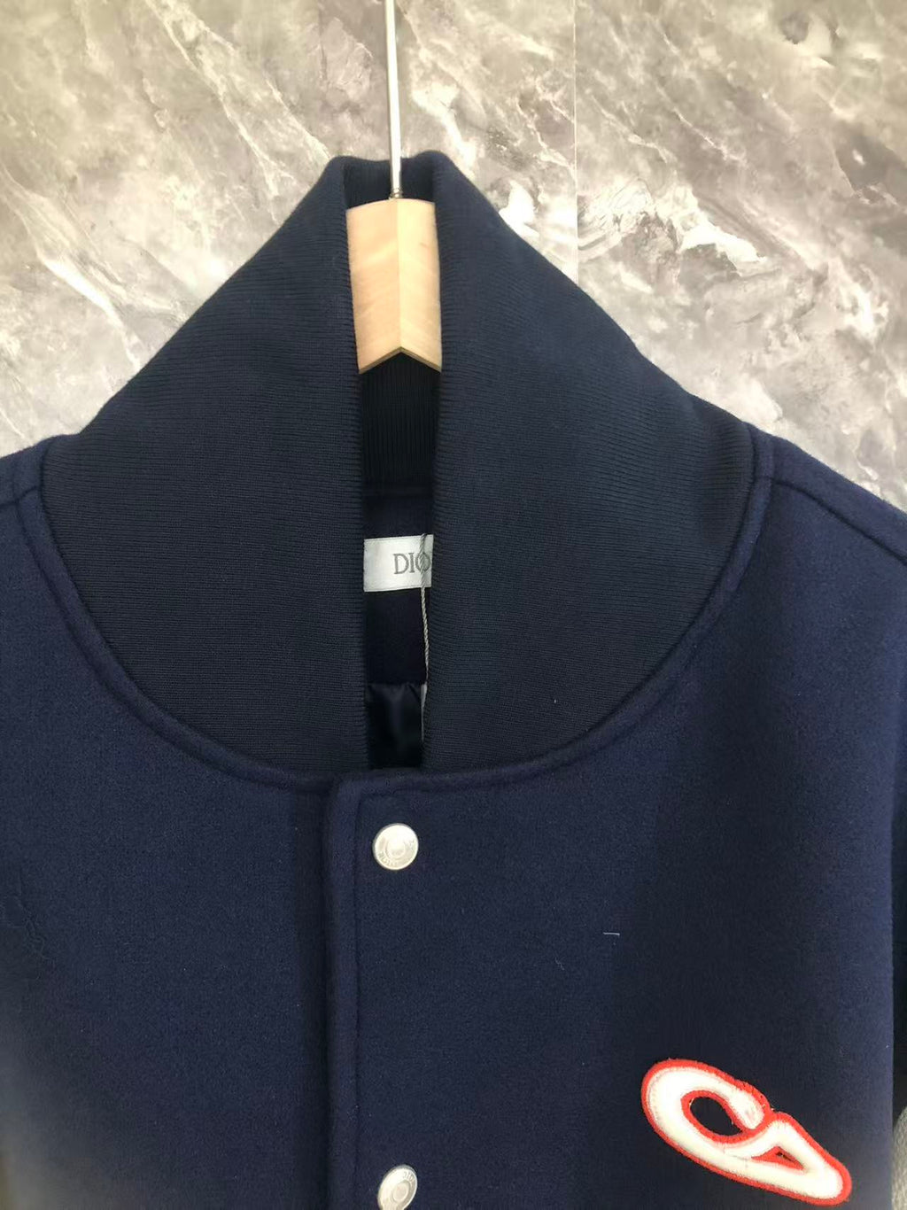 Dior varsity jacket collar with snap button front and small chest logo
