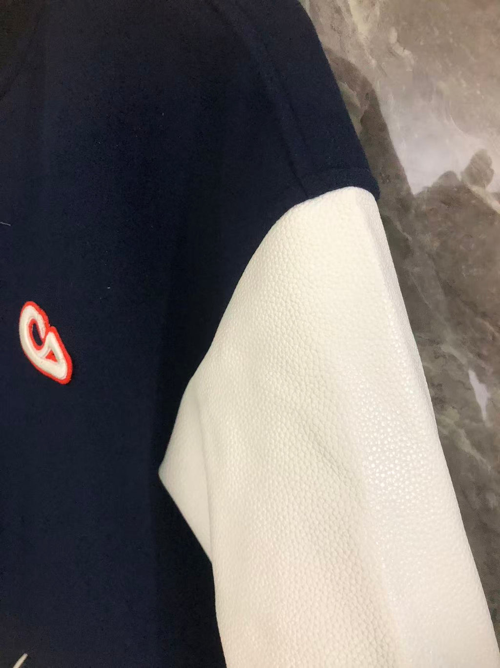 Dior varsity jacket navy front with white sleeve and side logo patch
