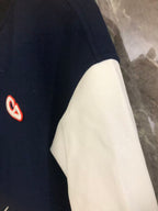 Dior varsity jacket navy front with white sleeve and side logo patch