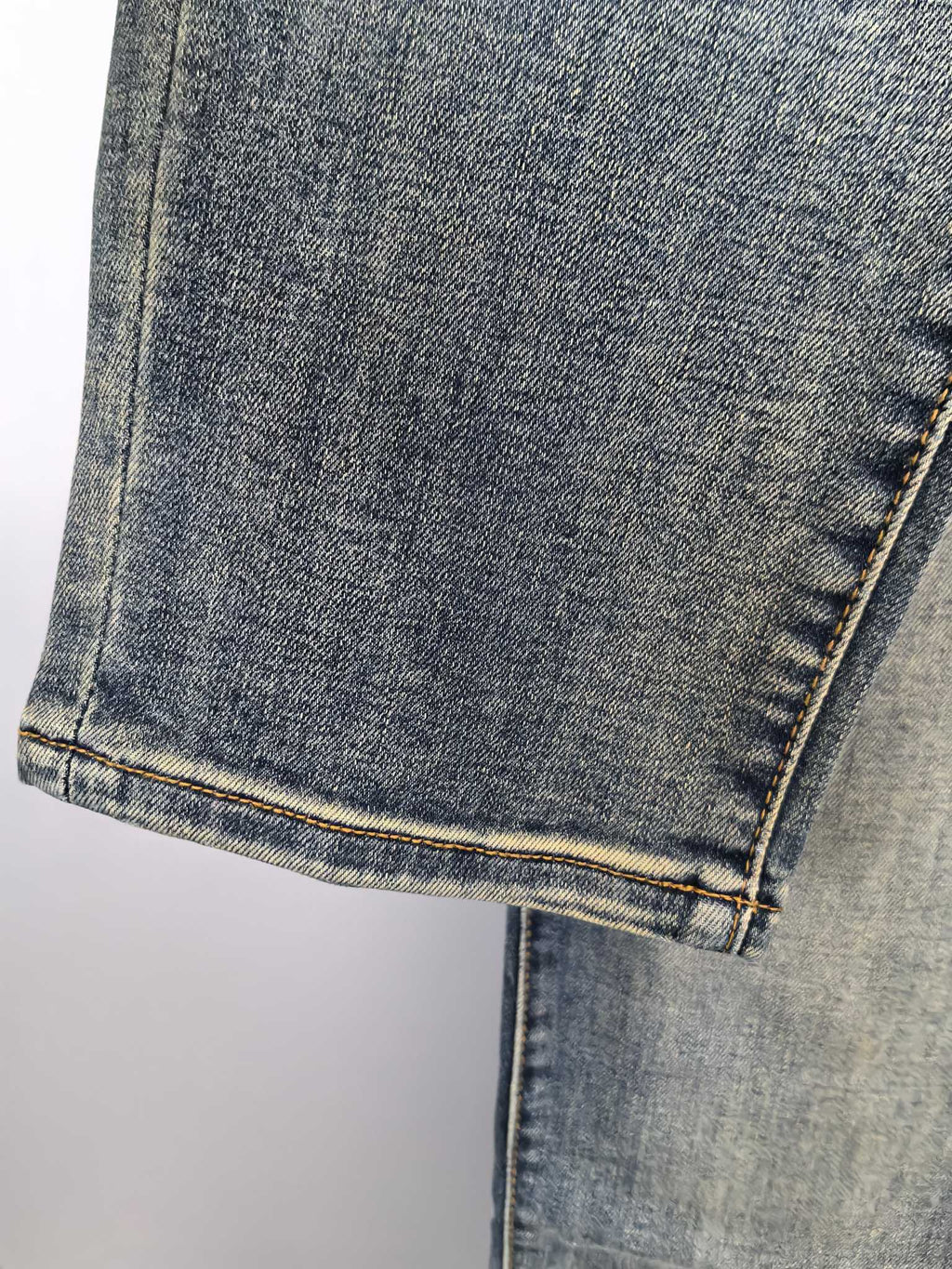 Prada denim pants hem and cuff with contrast topstitching
