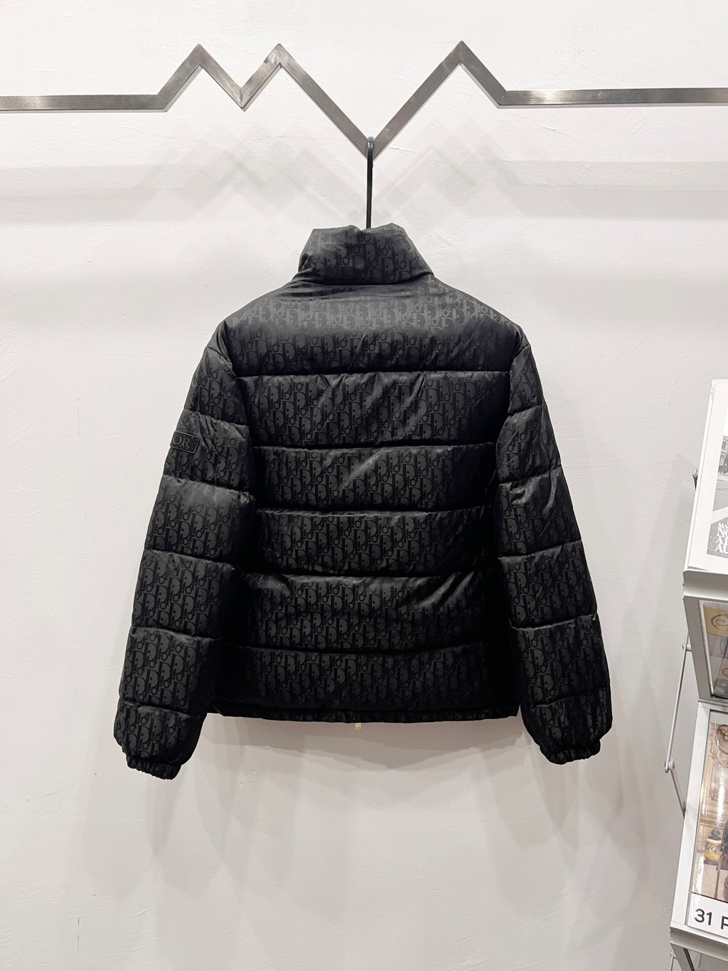 Dior quilted puffer jacket back view with full-zip and padded shoulders
