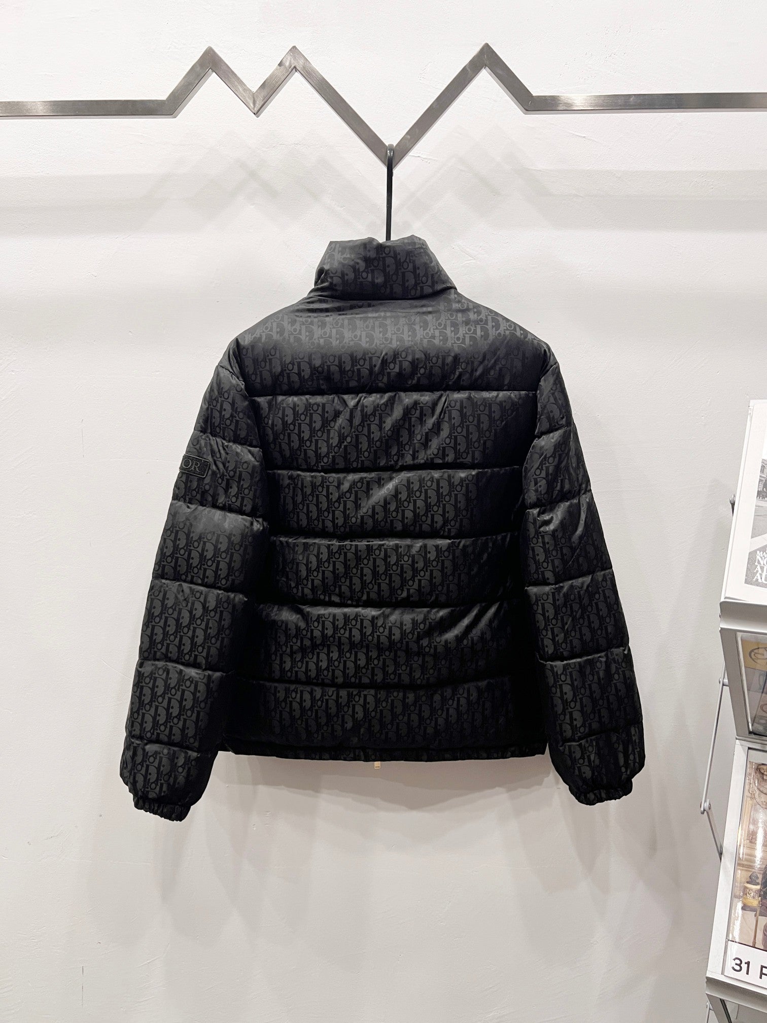 Dior quilted puffer jacket back view with full-zip and padded shoulders
