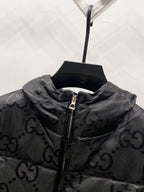 Gucci hooded puffer jacket collar detail with GG monogram and front zipper