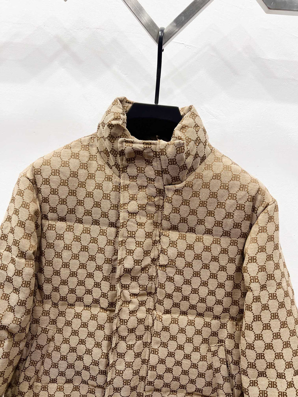 Gucci puffer jacket in beige with allover monogram, high collar and front button placket