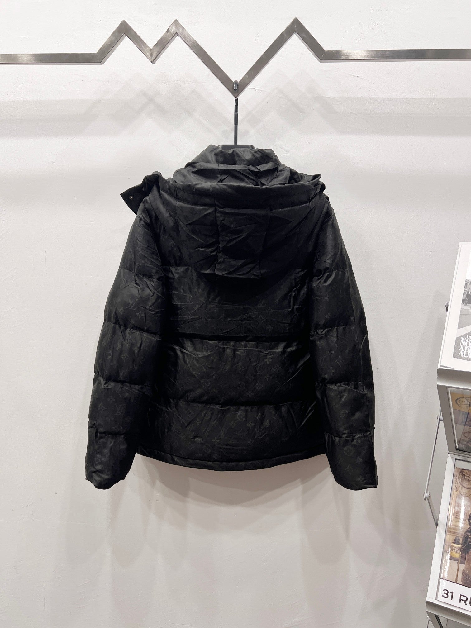 Black long puffer jacket with hood and zip front