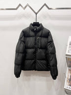 Moncler long puffer jacket, dark color, hooded, full-zip front and quilted panels