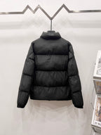 Moncler long puffer jacket with hood, dark quilting, long sleeves and full zipper