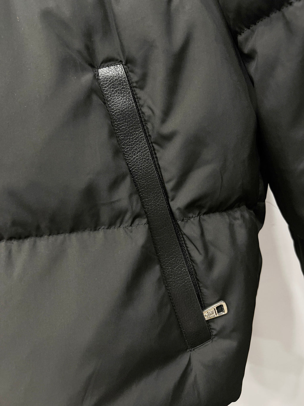Moncler long puffer jacket zipper with metal pull on dark padded panel