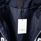 Givenchy clothing label on dark navy bomber jacket interior near the collar