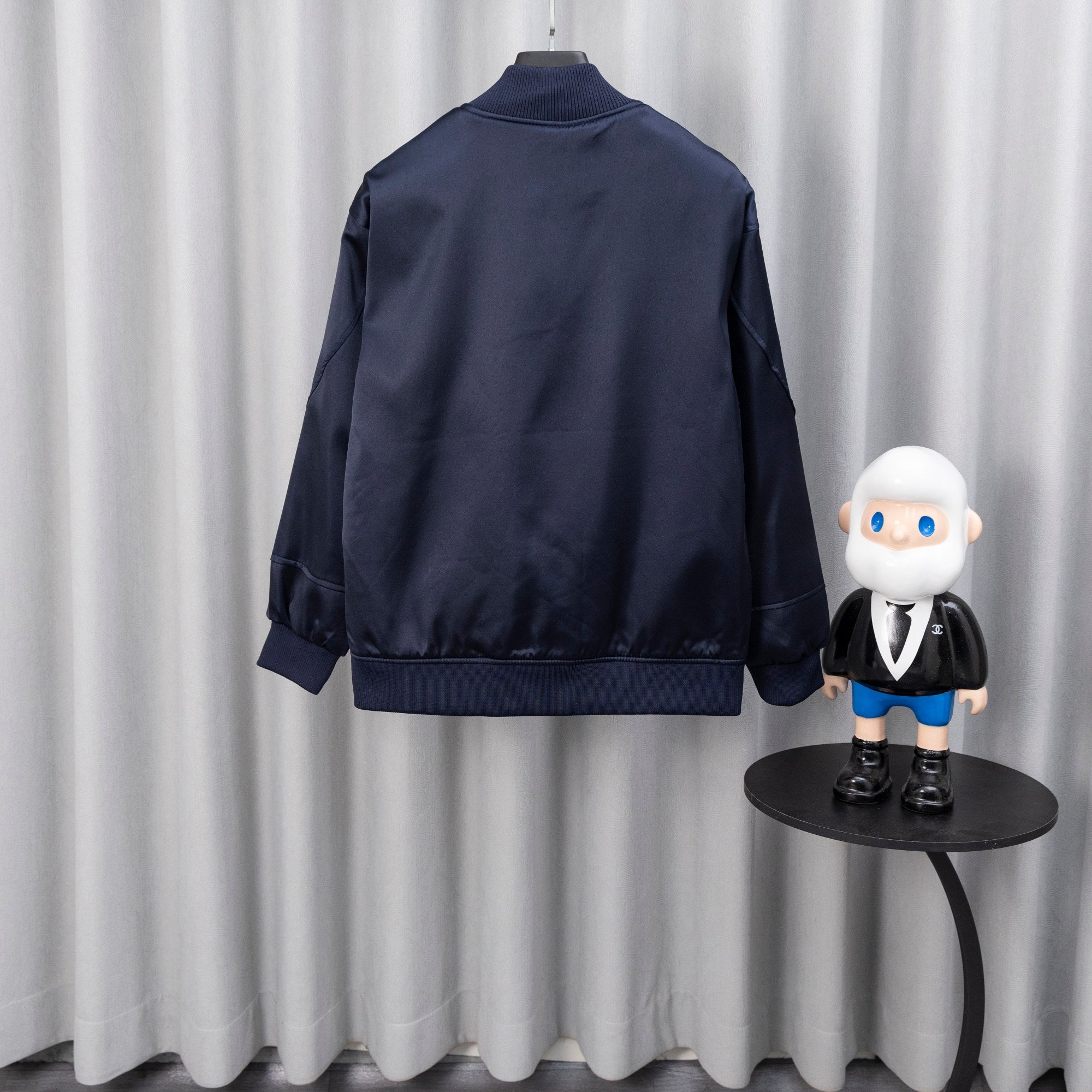 Givenchy bomber jacket in dark navy, back view with ribbed hem and cuffs