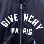 Givenchy bomber jacket logo lettering in white on dark navy front