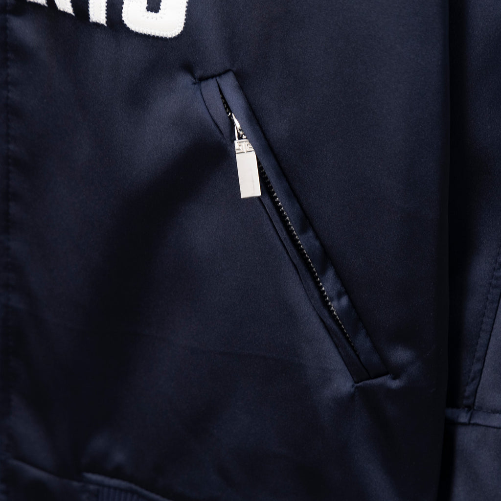 Givenchy bomber jacket side pocket with hidden zip on dark navy fabric