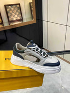 FENDI unisex lace-up sneakers, side view in white with navy accents and thick sole