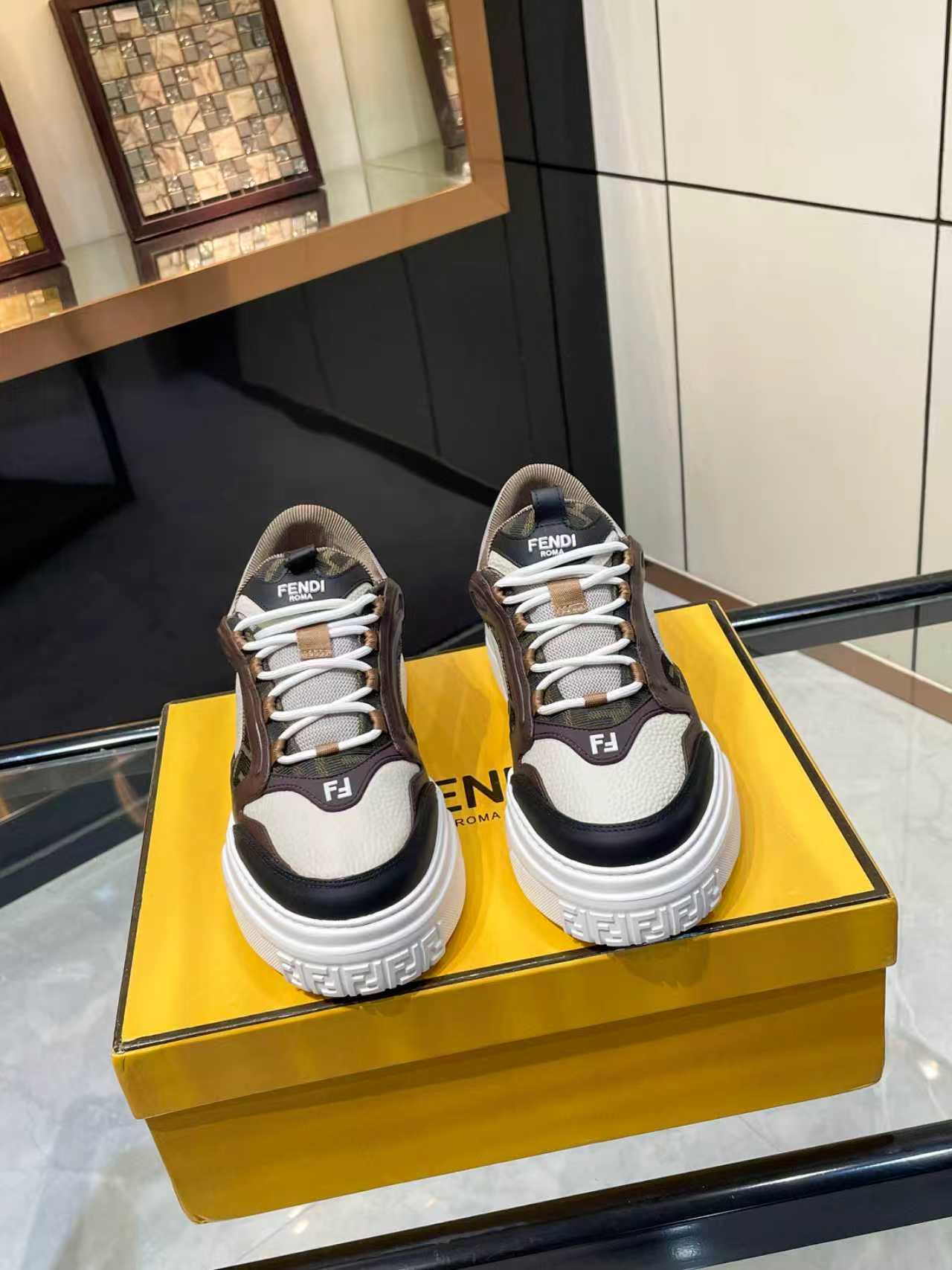 Pair of Fendi unisex chunky sneakers, brown and black uppers with white platform sole