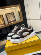 Fendi unisex chunky lace-up sneakers in black, brown, and gray with white platform sole