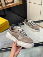 Taupe suede-style Fendi lace-up sneakers with chunky white midsole and embossed logo