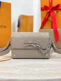 Louis Vuitton bag, light gray monogram embossing, silver chain strap, front clasp