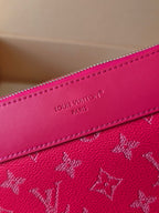 Pink Louis Vuitton small bag strap with stitched logo text and monogram pattern panel.