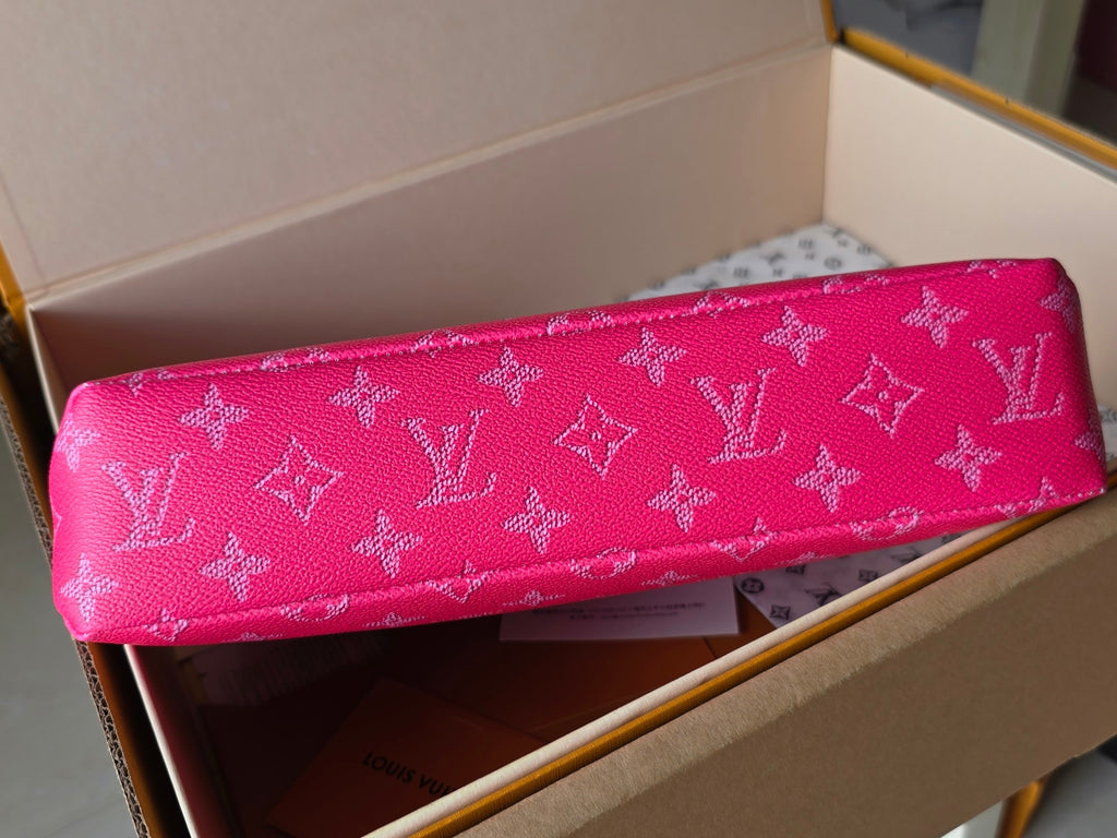 Louis Vuitton pink monogram zip pouch bag laid open, long horizontal profile