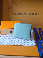 Small bag wallet in light blue with Louis Vuitton monogram on front